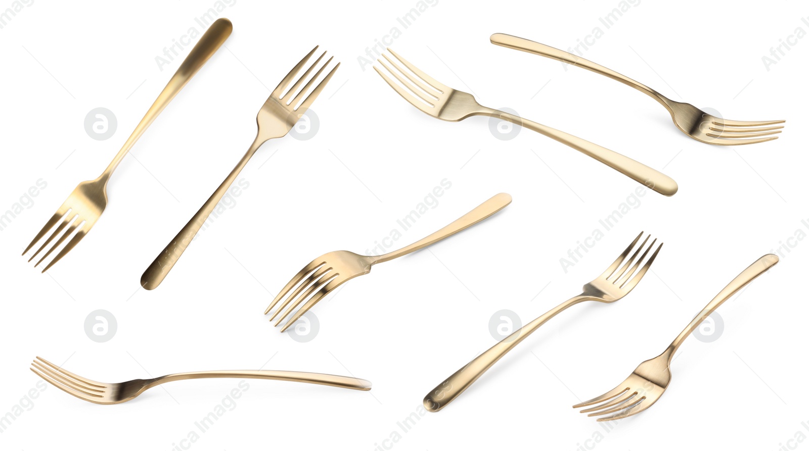 Image of Shiny golden forks isolated on white, set