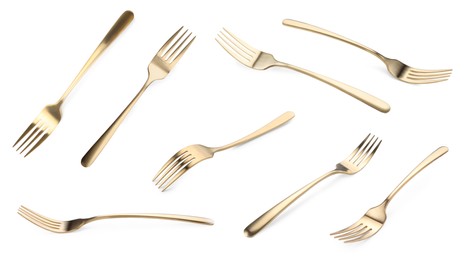 Shiny golden forks isolated on white, set