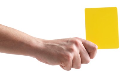 Referee holding yellow card on white background, closeup