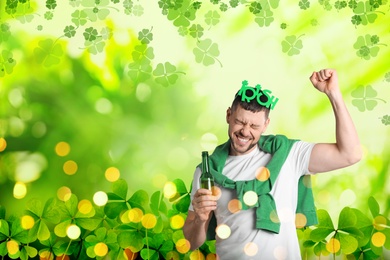Image of Emotional man in St. Patrick's Day outfit with beer on green background, space for text