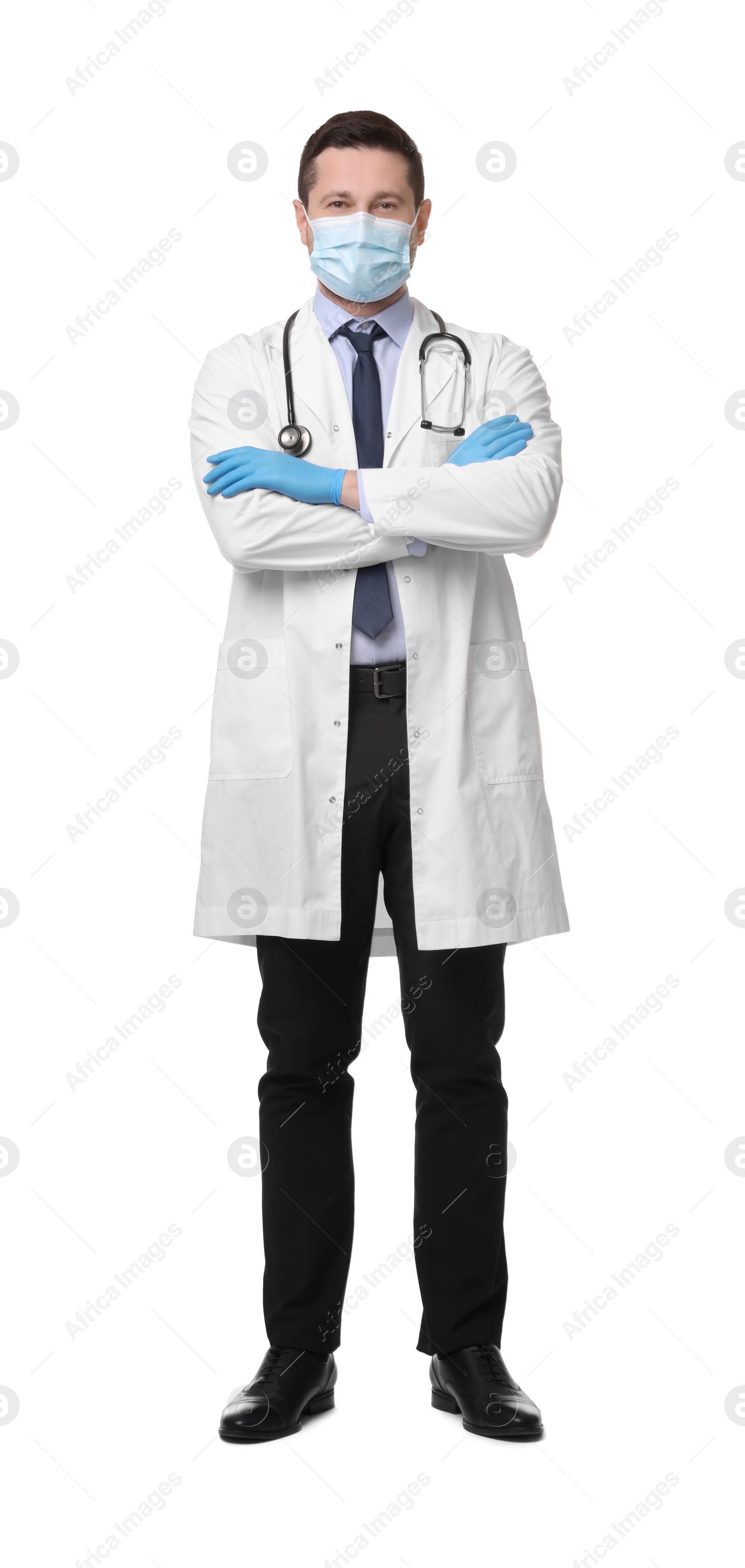 Photo of Doctor in medical mask and gloves isolated on white