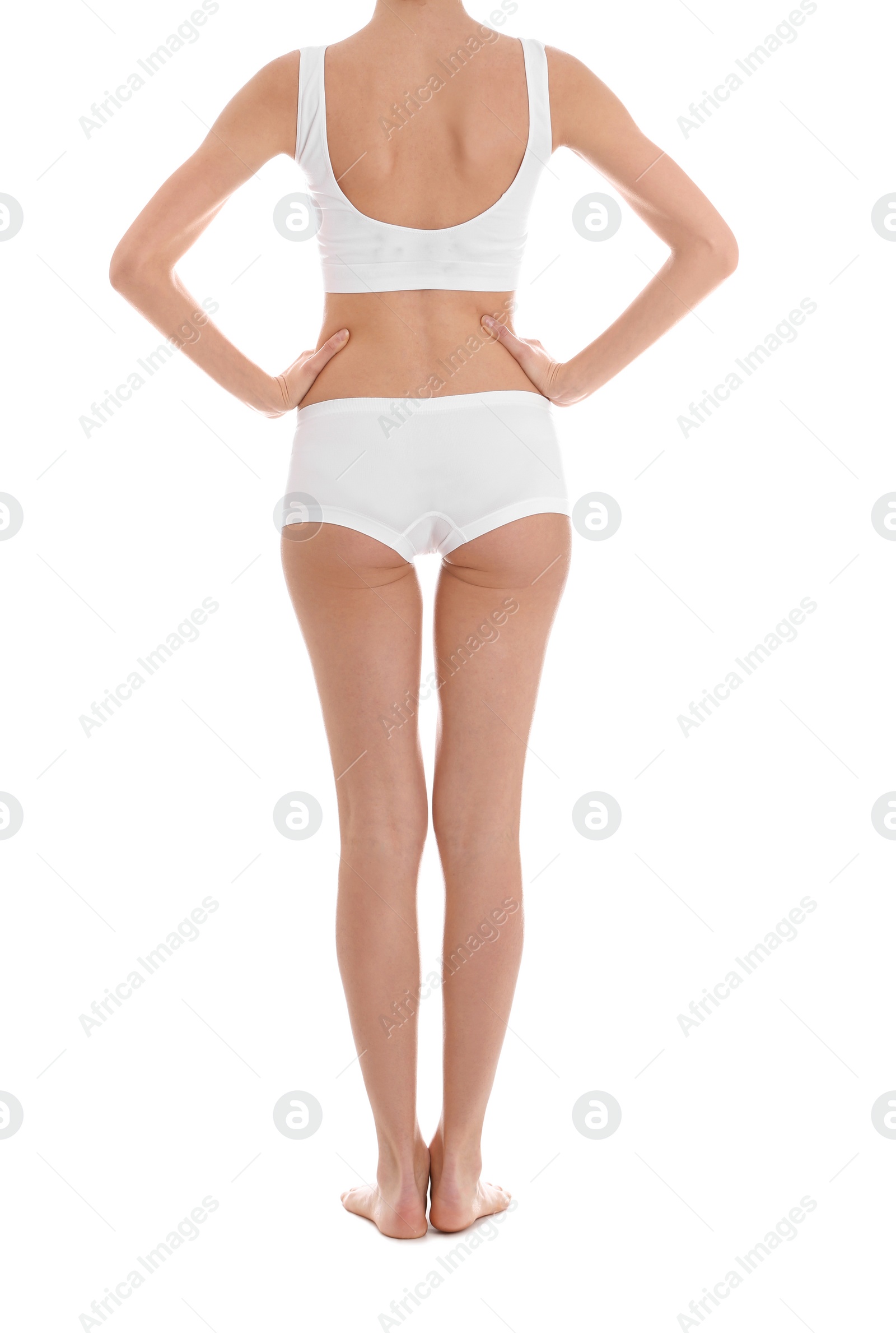 Photo of Young slim woman on white background, closeup. Weight loss