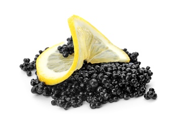 Photo of Black caviar and lemon slices on white background