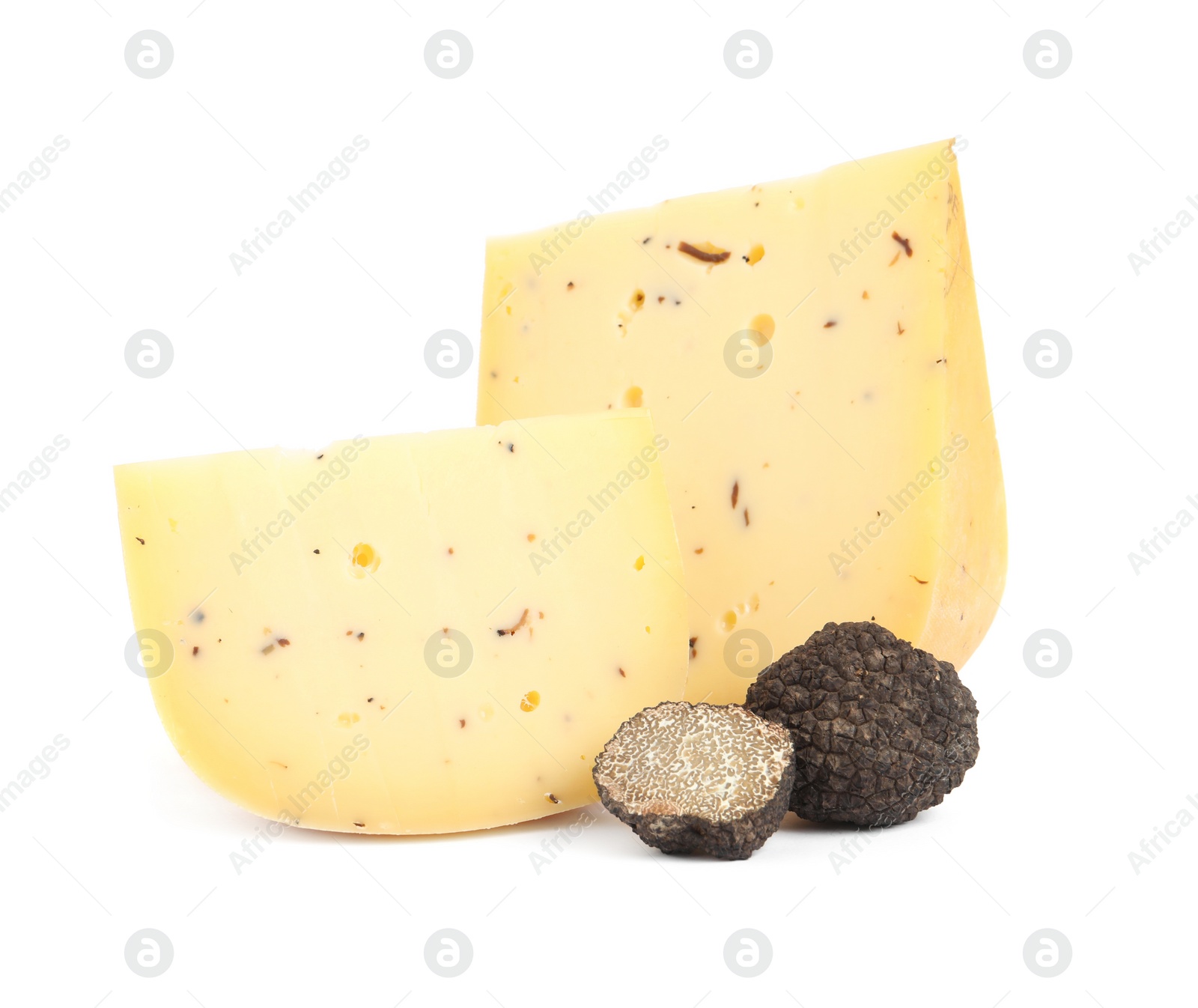 Photo of Pieces of delicious cheese with fresh black truffles on white background