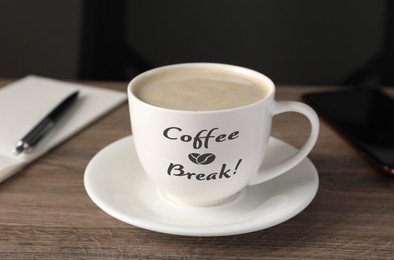 Image of Cup with inscription Coffee Break on wooden table in office