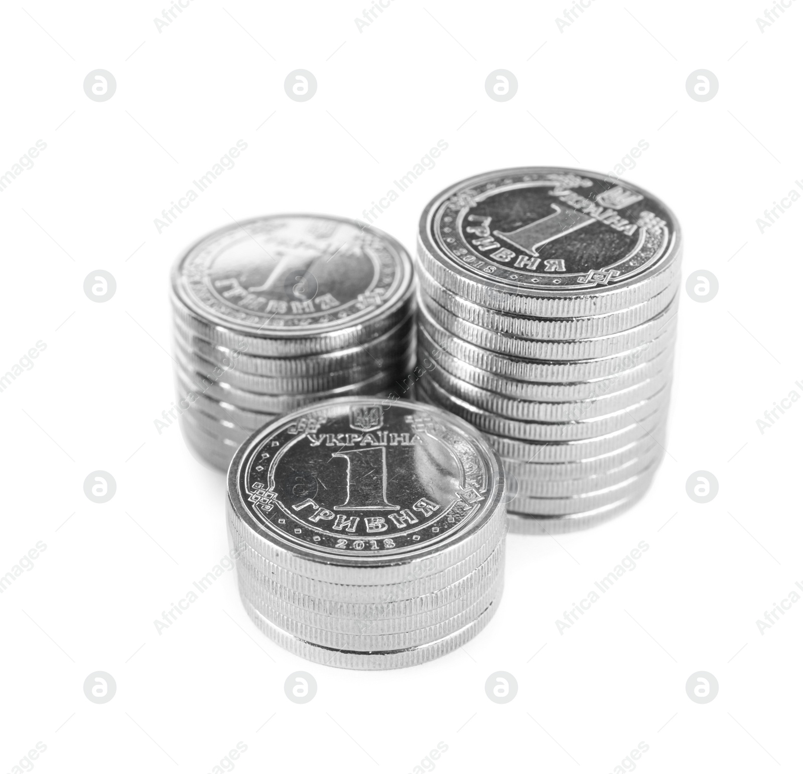 Photo of Ukrainian coins isolated on white. National currency