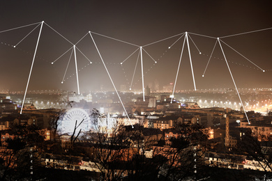 Image of Modern city at night and radio network. Connection concept