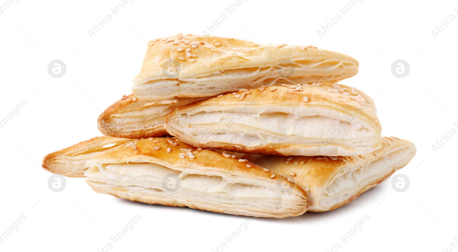 Photo of Delicious fresh puff pastries isolated on white