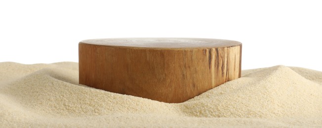 Photo of Presentation of product. Wooden podium on sand against white background