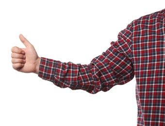 Photo of Man showing thumb up on white background, closeup of hand. Hitchhiking gesture