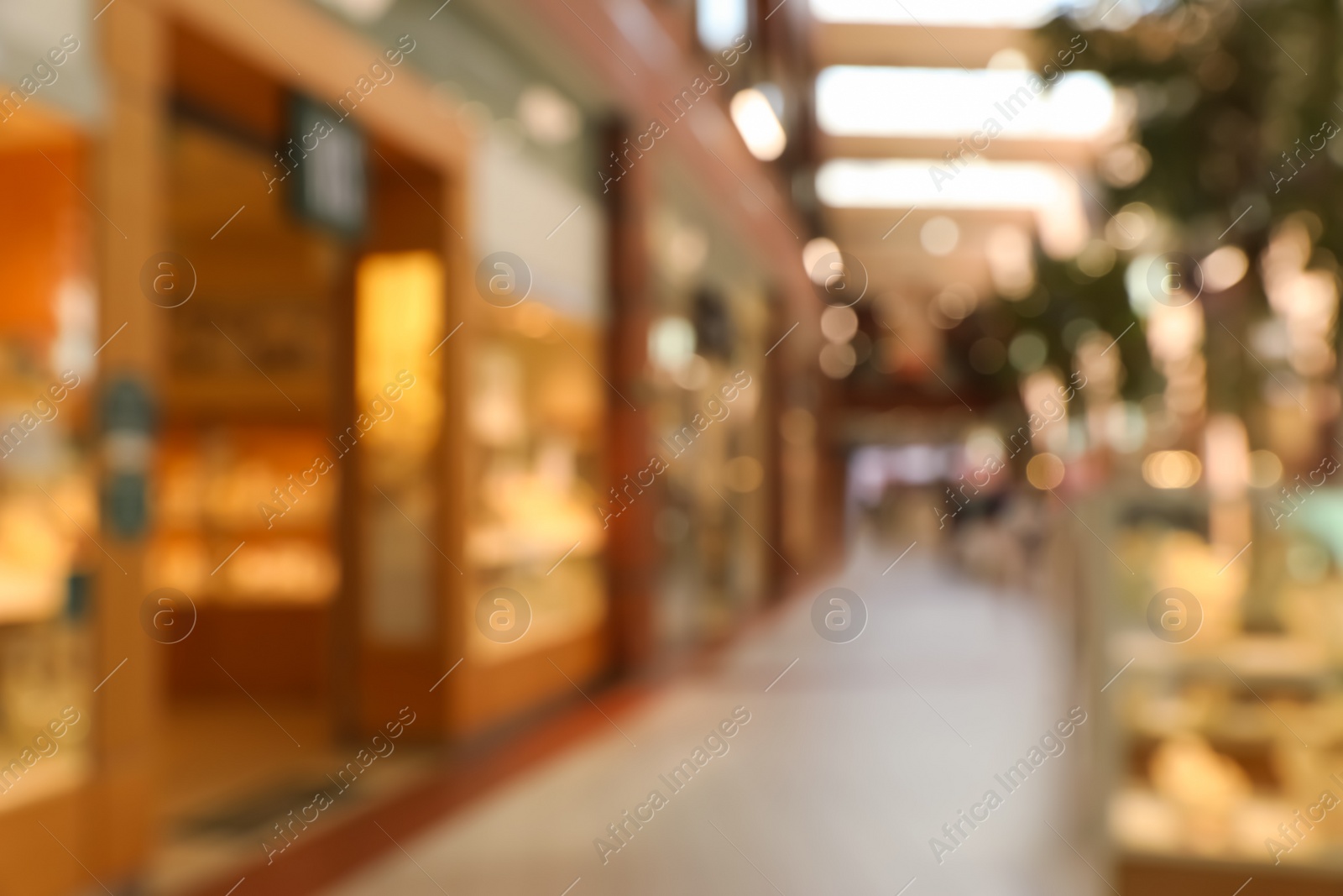 Photo of Blurred view of shopping mall interior. Bokeh effect