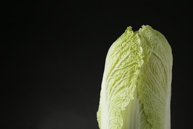 Fresh ripe Chinese cabbage on black background, space for text