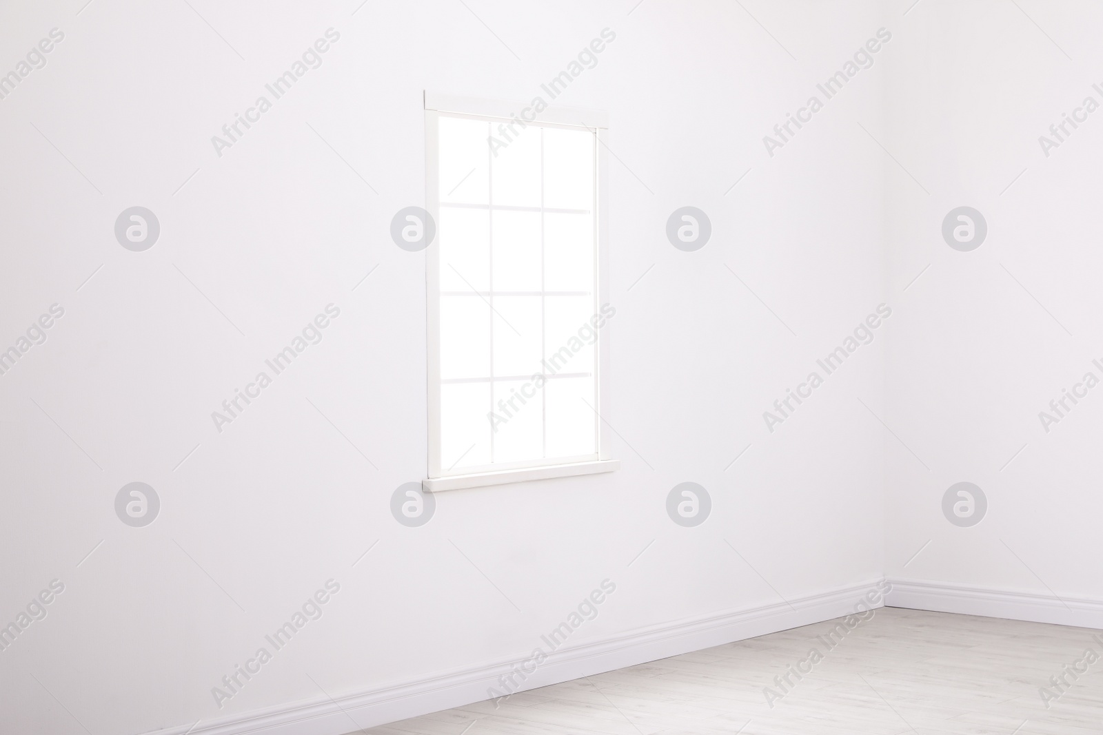 Photo of Simple vintage window on white wall indoors
