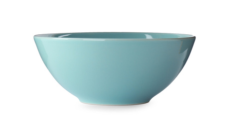 Photo of New blue ceramic bowl isolated on white