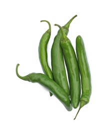 Photo of Green hot chili peppers on white background, top view