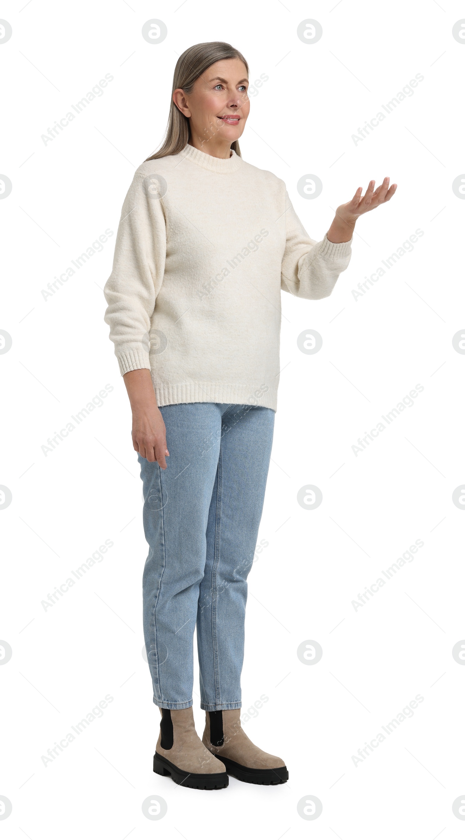 Photo of Full length portrait of senior woman on white background