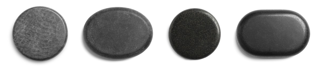 Image of Set with black spa stones on white background, top view. Banner design