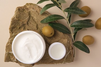 Flat lay composition with different natural cosmetic products on beige background