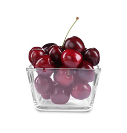 Photo of Tasty ripe red cherries in glass bowl isolated on white