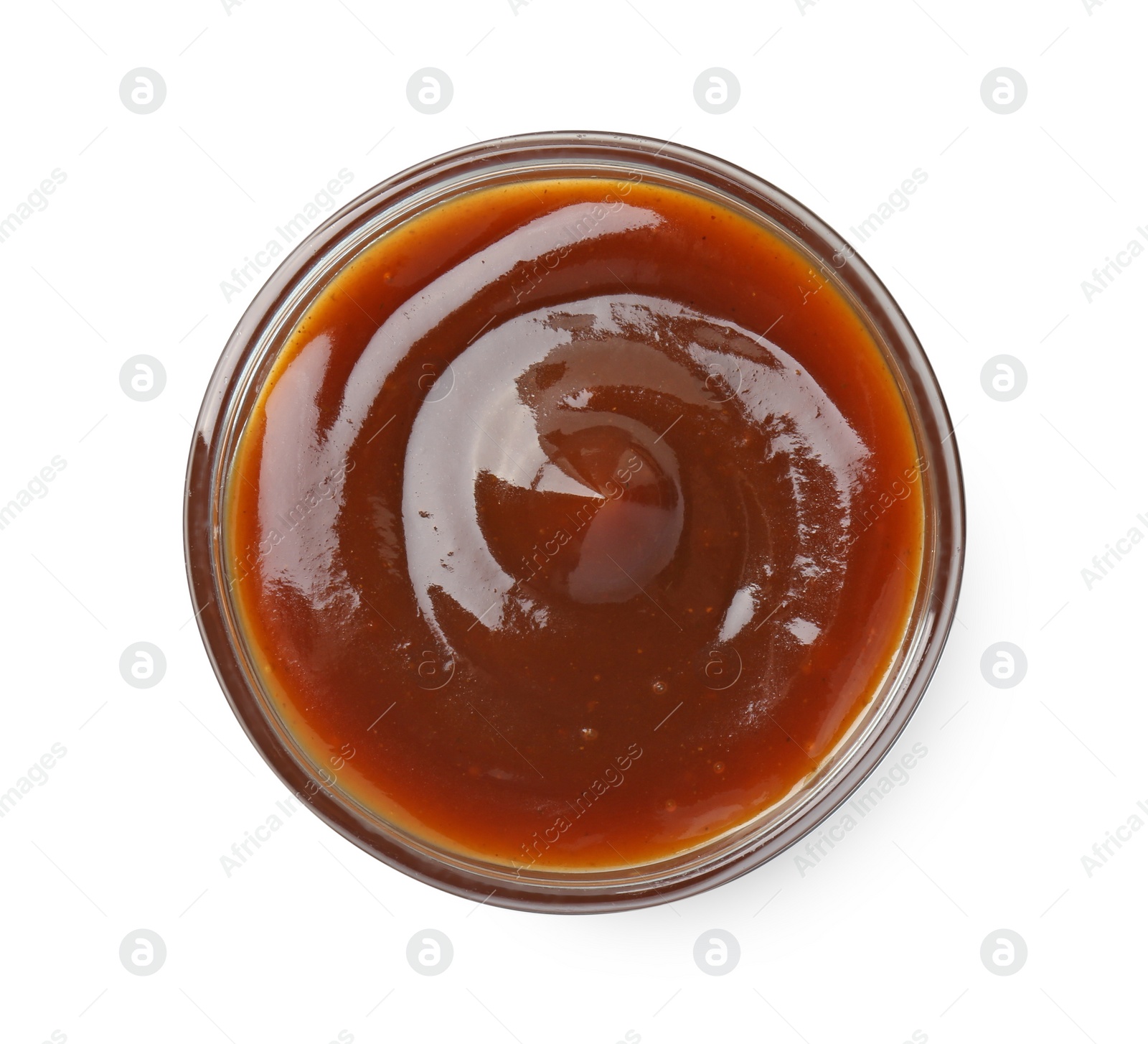 Photo of Tasty barbecue sauce in bowl isolated on white, top view