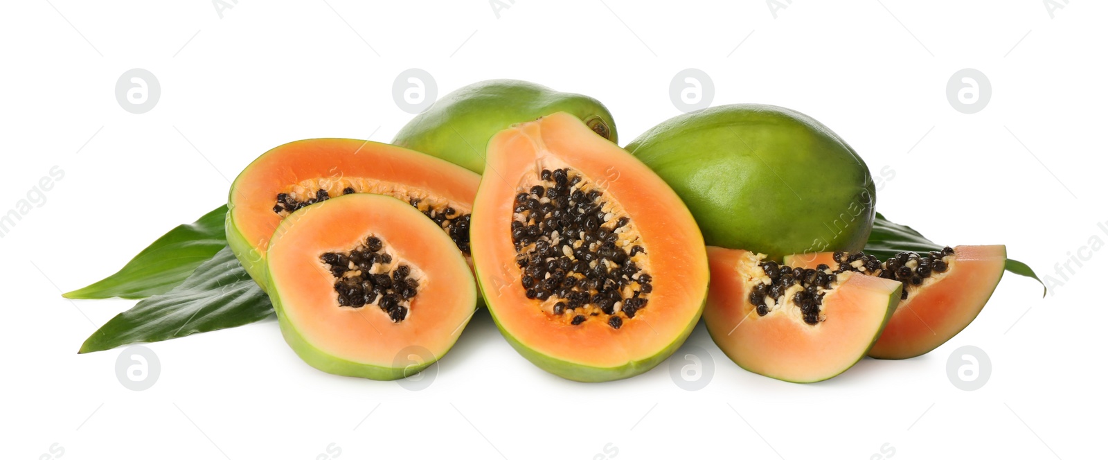 Photo of Fresh ripe papaya fruits with green leaves on white background