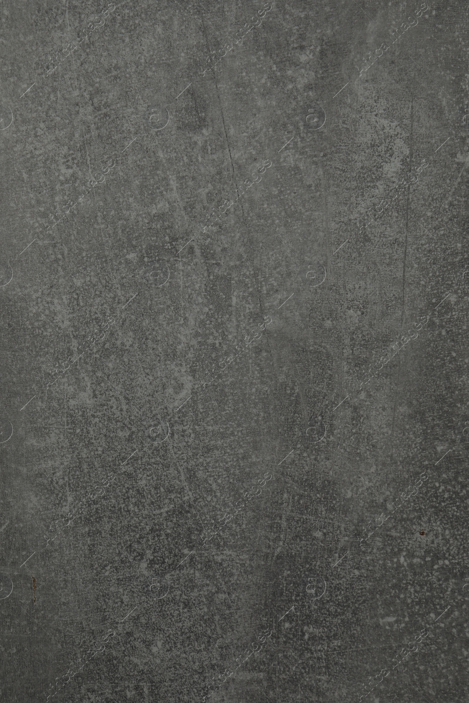 Photo of Texture of grey stone surface as background, closeup