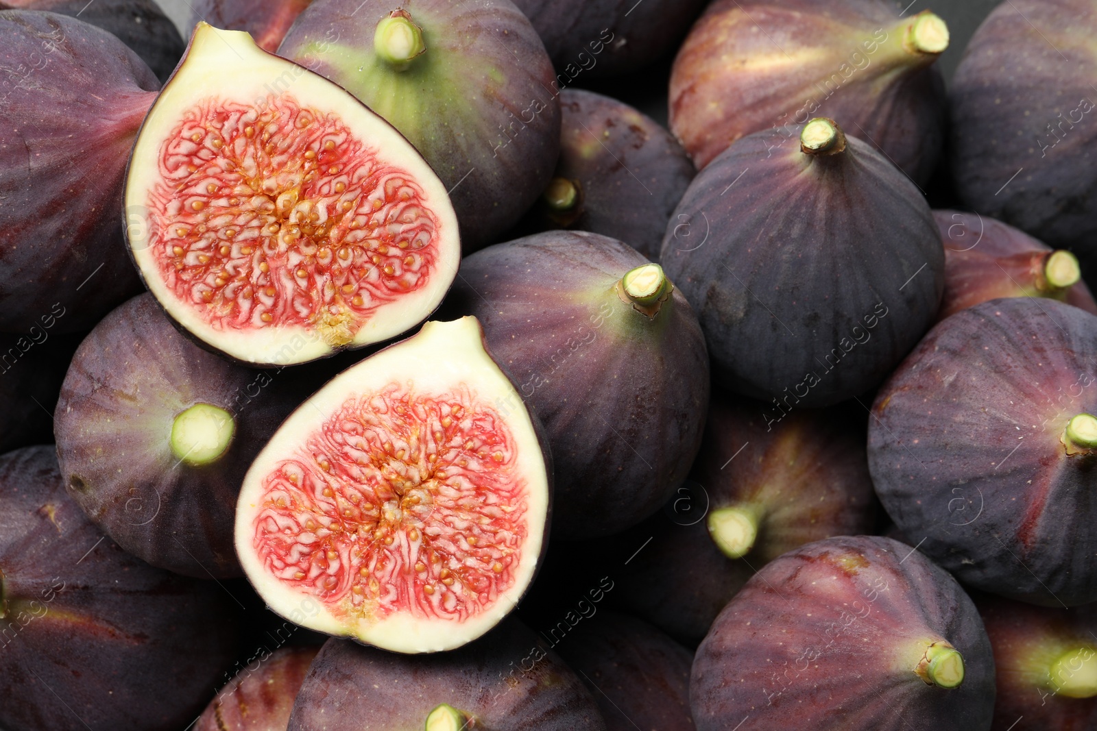 Photo of Fresh ripe figs as background, closeup view