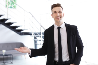 Photo of Male real estate agent indoors