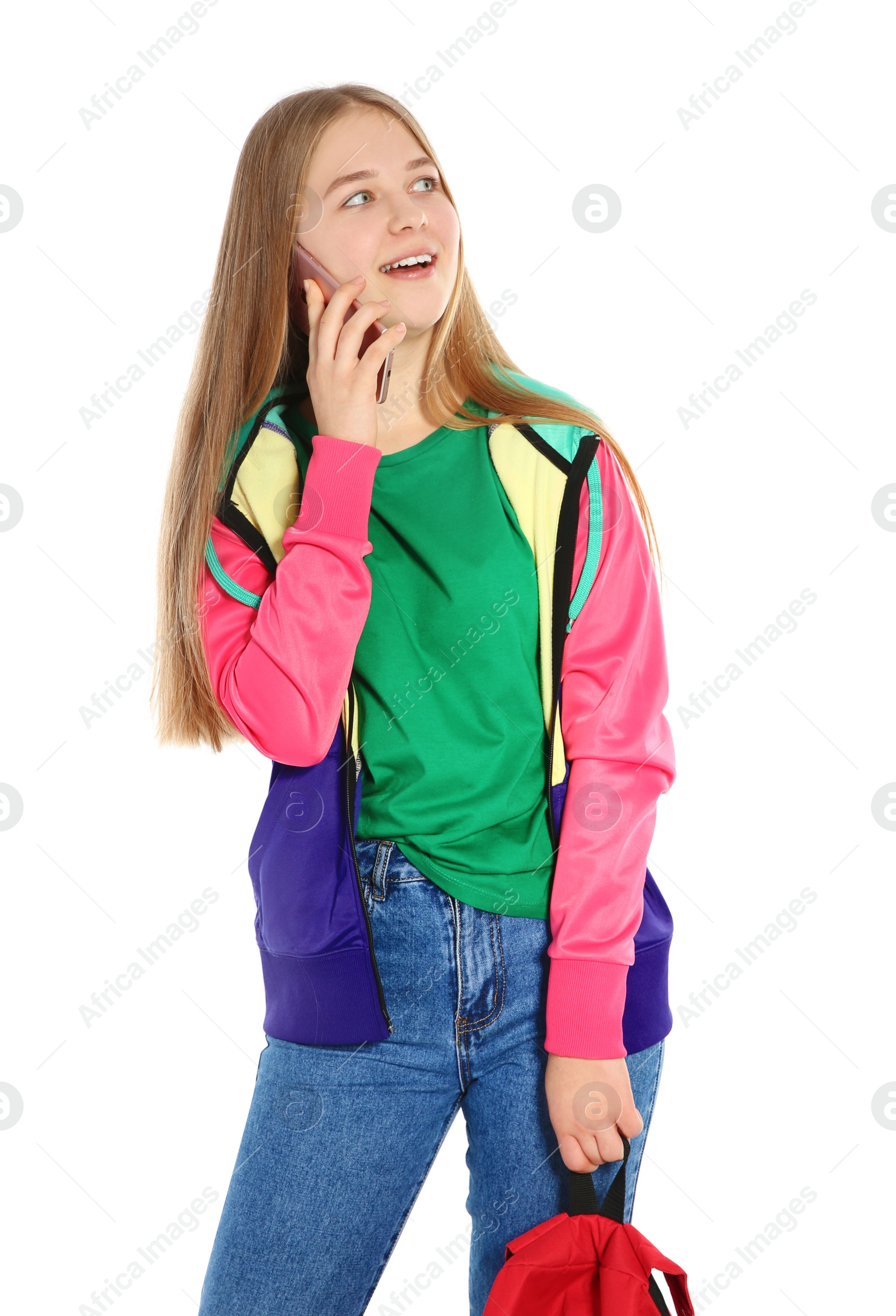 Photo of Happy teenager girl with mobile phone on white background
