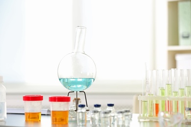 Laboratory glassware on table indoors. Research and analysis