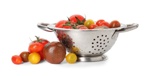 Photo of Metal colander with fresh tomatoes isolated on white