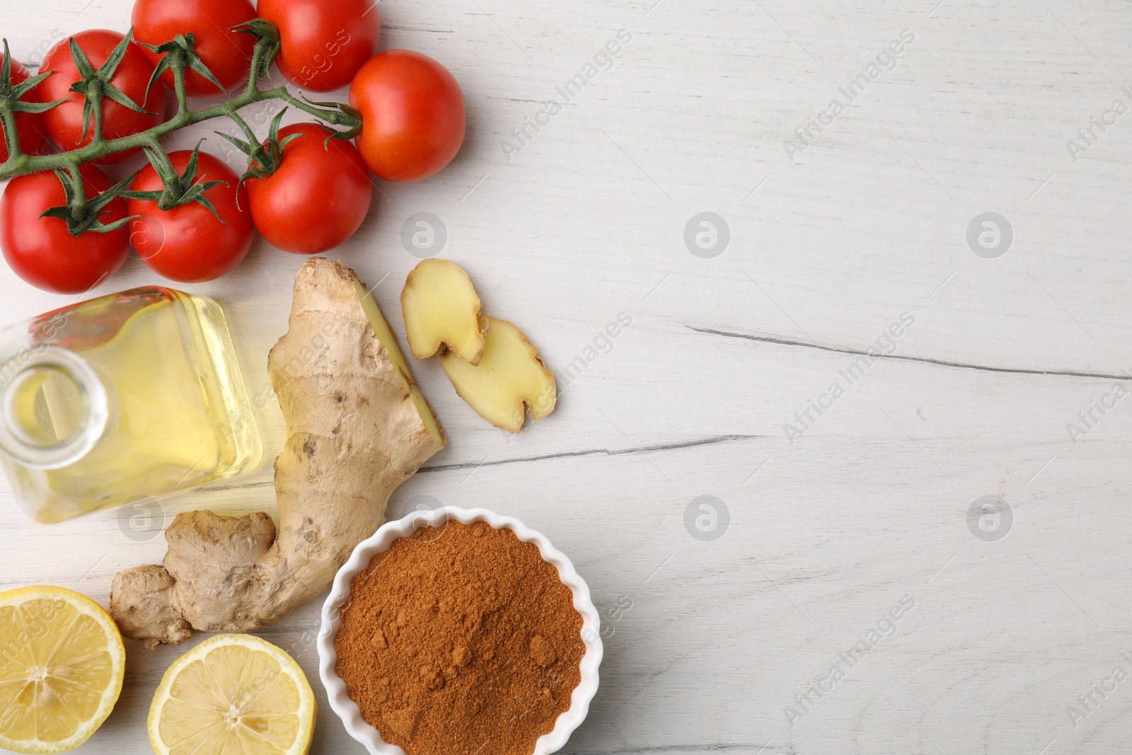 Photo of Different fresh ingredients for marinade on white wooden table, flat lay. Space for text