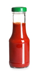 Photo of Delicious tomato sauce in glass bottle on white background