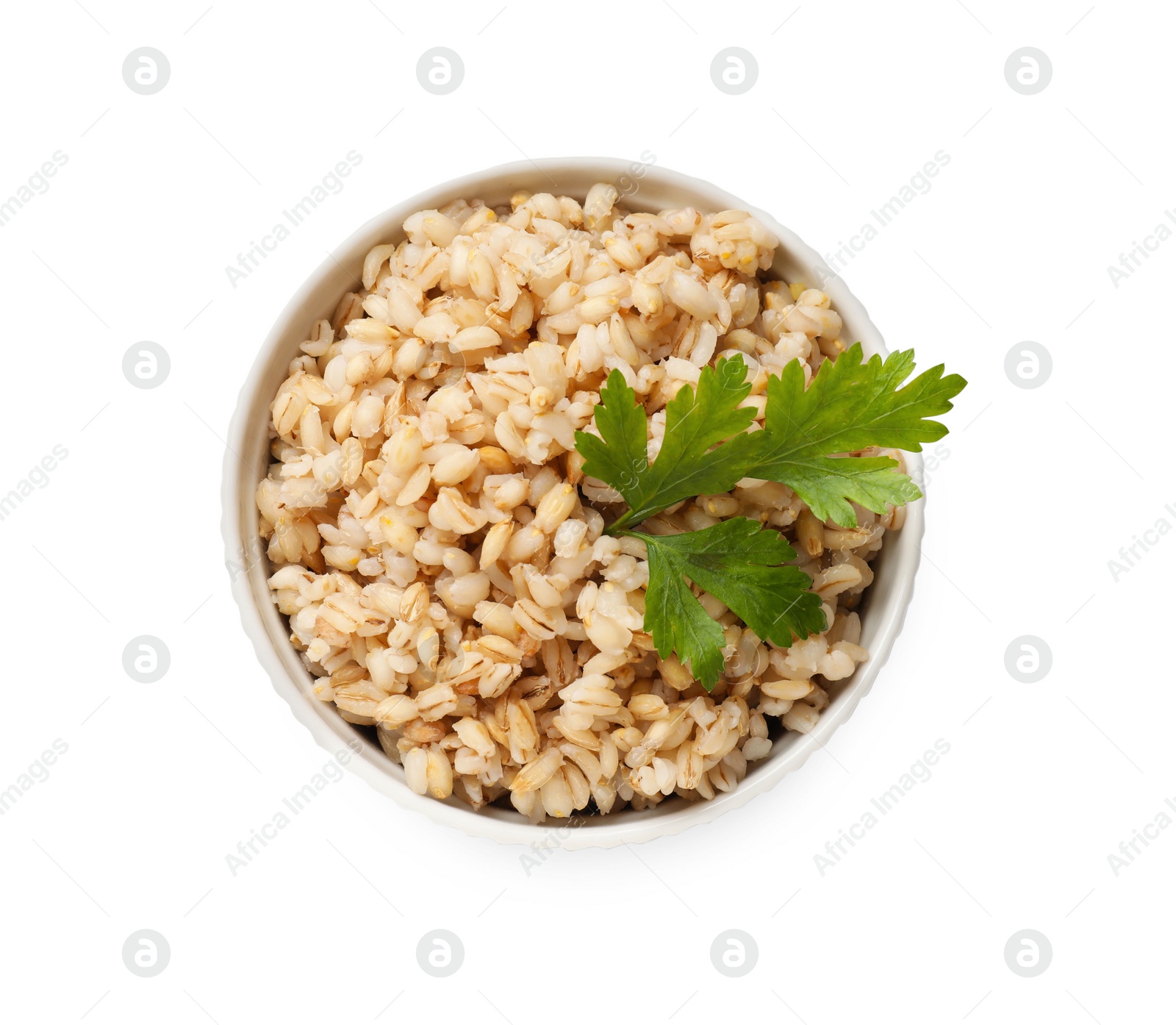 Photo of Delicious pearl barley with parsley in bowl isolated on white, top view