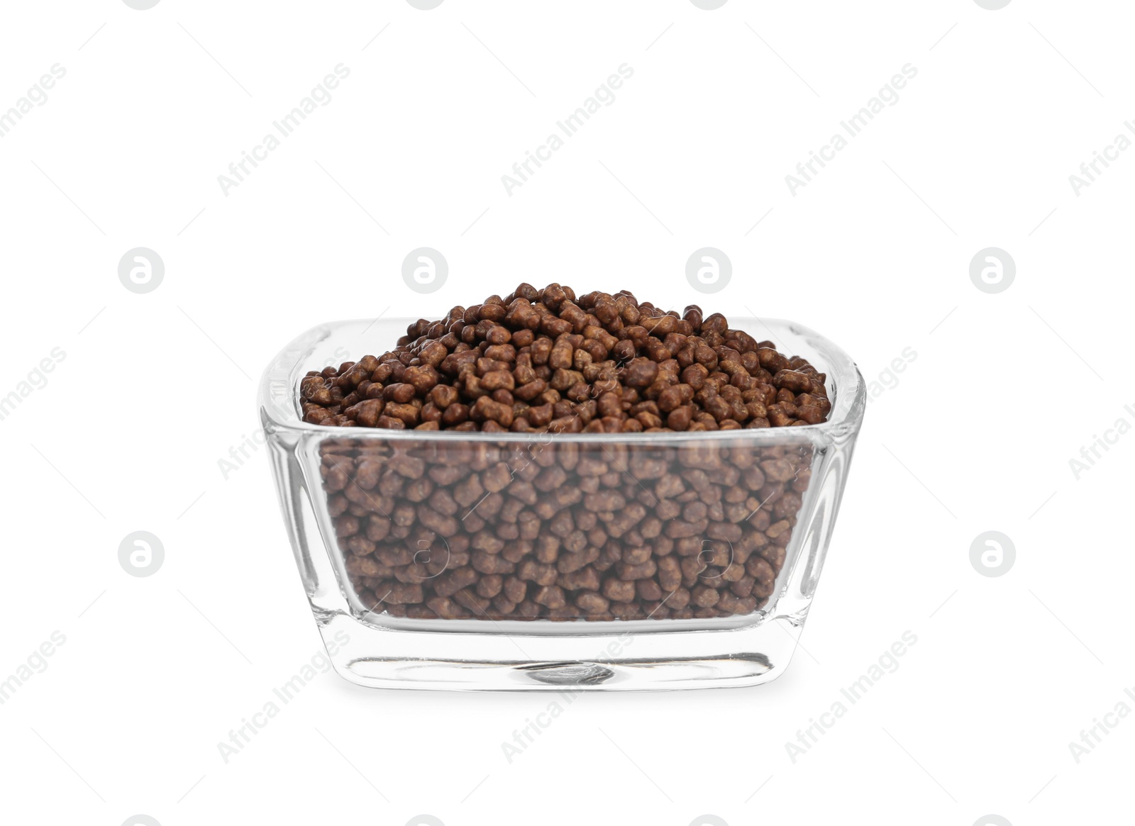 Photo of Buckwheat tea granules in glass bowl on white background