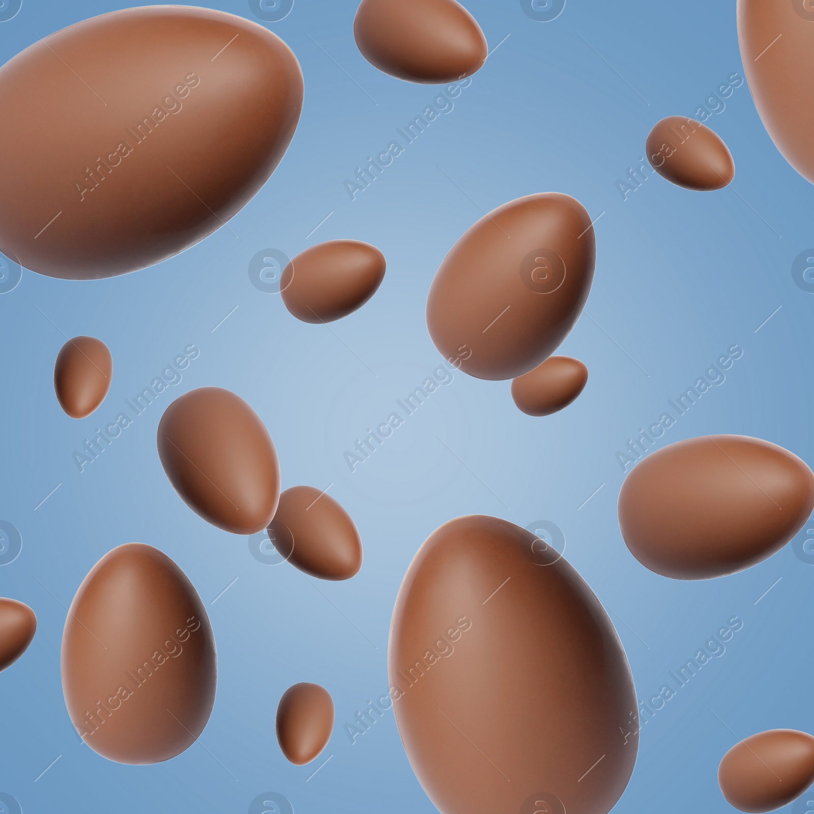 Image of Many chocolate eggs falling on dusty blue background