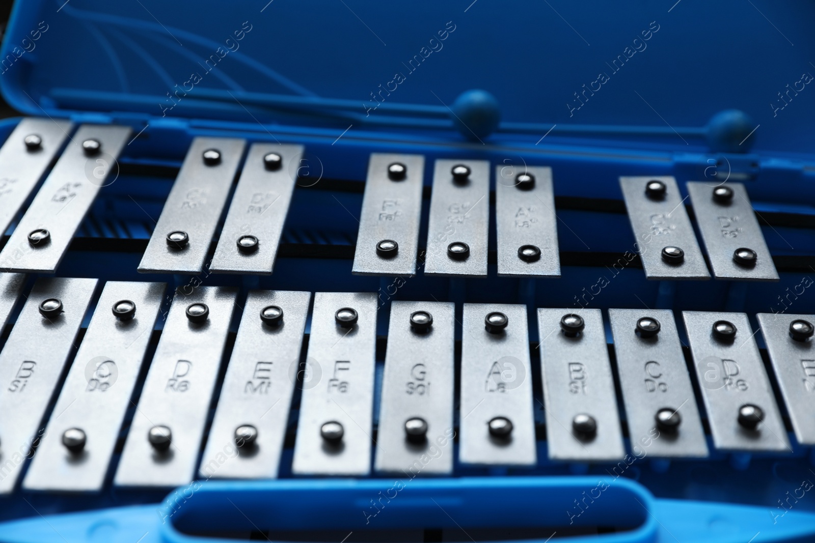 Photo of Closeup view of xylophone in light blue case