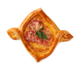 Fresh delicious puff pastry with cheese, tomatoes and parsley on white background, top view