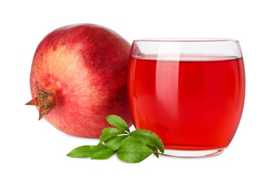 Photo of Refreshing pomegranate juice in glass, leaves and fruit isolated on white