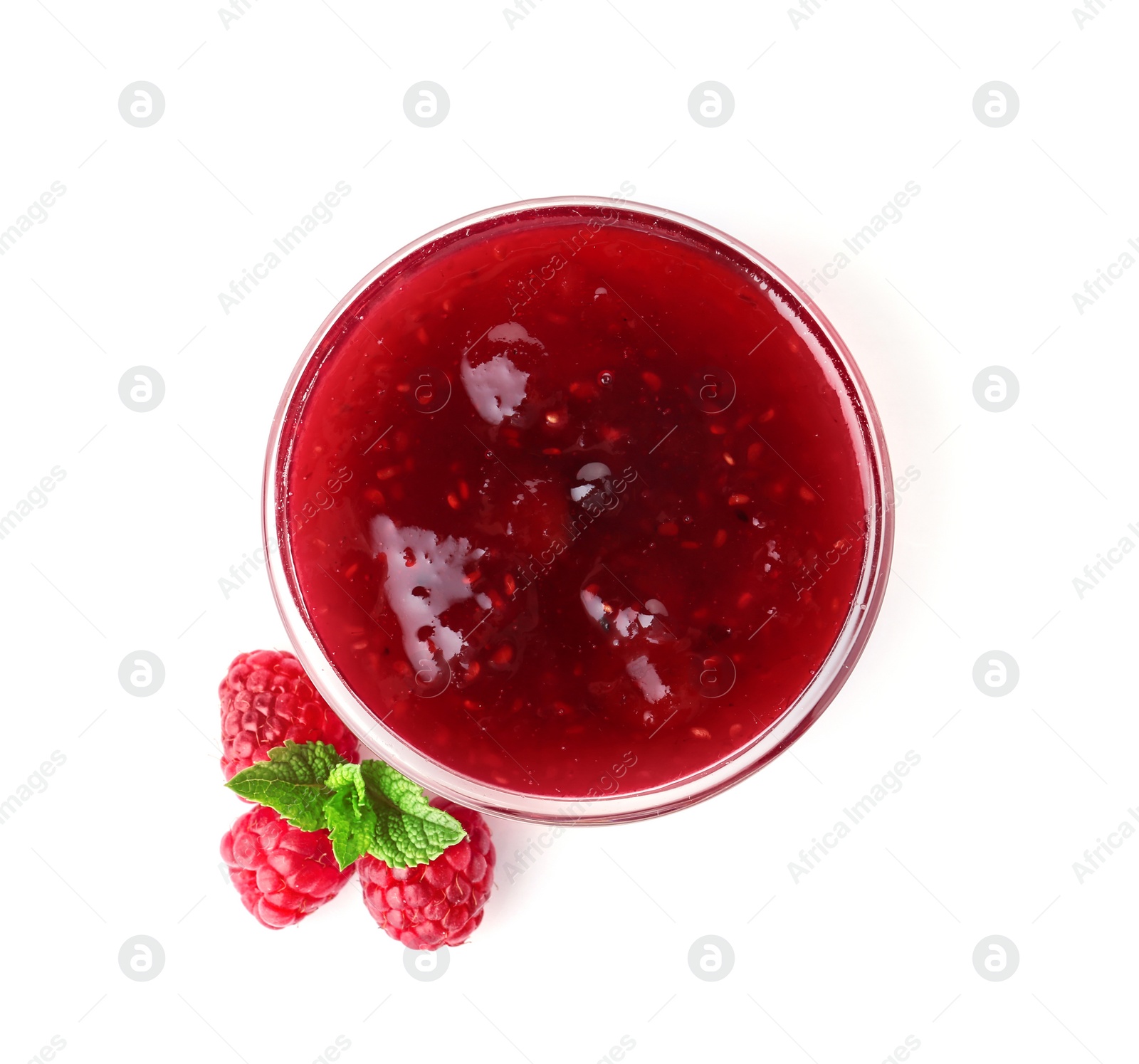 Photo of Bowl with delicious raspberry jam on white background, top view