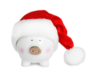 Cute piggy bank with Santa hat on white background