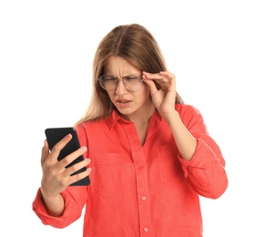 Young woman with vision problems using smartphone on white background