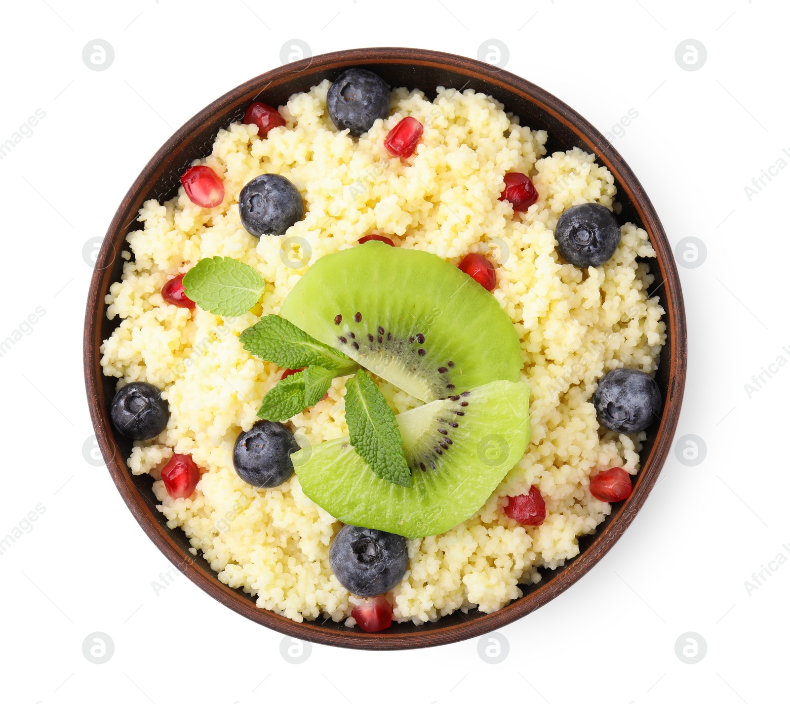 Photo of Bowl of tasty couscous with kiwi, blueberries and pomegranate isolated on white, top view