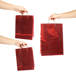 Image of Collage of women holding paper shopping bags on white background, closeup