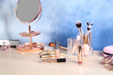 Set of luxury cosmetics on dressing table