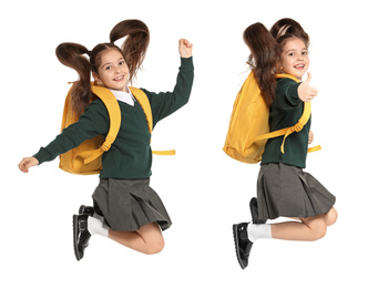 Girl in school uniform jumping on white background