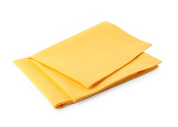 Photo of New clean yellow cloth napkins isolated on white