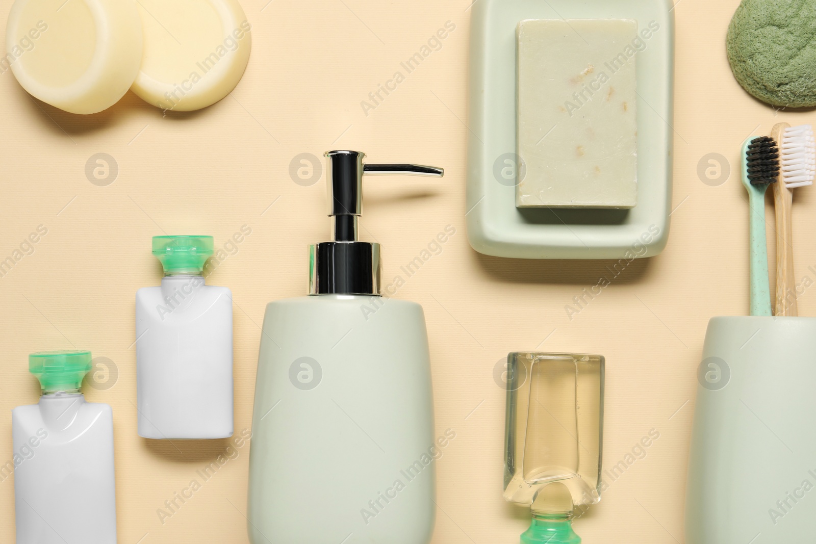 Photo of Bath accessories. Flat lay composition with personal care products on beige background