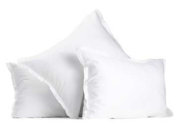 Many new soft pillows isolated on white