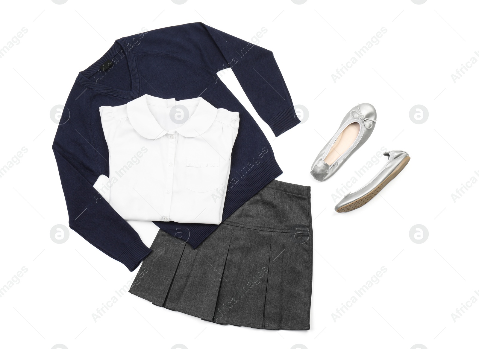 Photo of Stylish school uniform on white background, top view